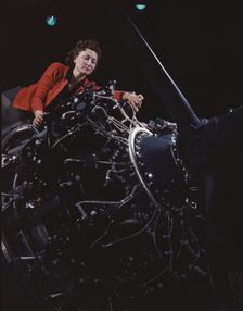 Woman at work on motor, Douglas Aircraft Company, Long Beach, Calif., 1942. Creator: Alfred T Palmer