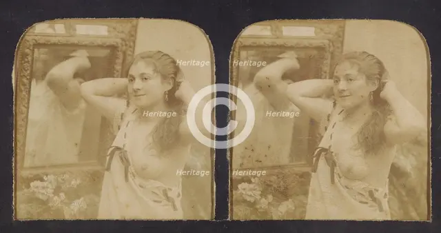 Woman before mirror with hands behind head, one breast exposed, 1855-1860. Creator: Unknown.