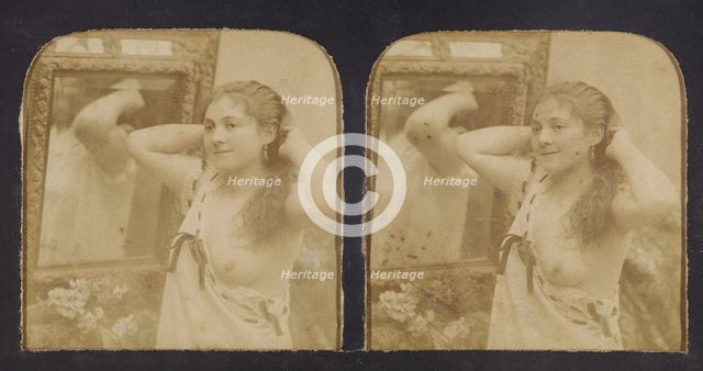 Woman before mirror with hands behind head, one breast exposed, 1855-1860. Creator: Unknown.