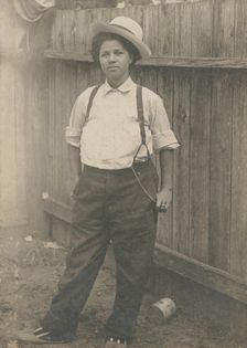 Woman dressed in men's clothing, c1890. Creators: G. Walter Roberts, Unknown