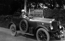 Woman driving a car, 1930