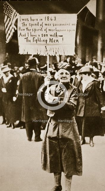 Woman holding a placard in support of the war effort, USA, World War I, c1914-c1918. Artist: Unknown