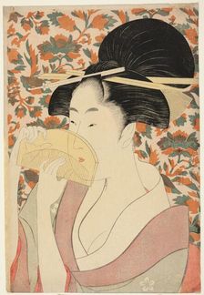 Woman Holding a Tortoise-shell Hair-comb, Japan, c. 1795/96. Creator: Kitagawa Utamaro