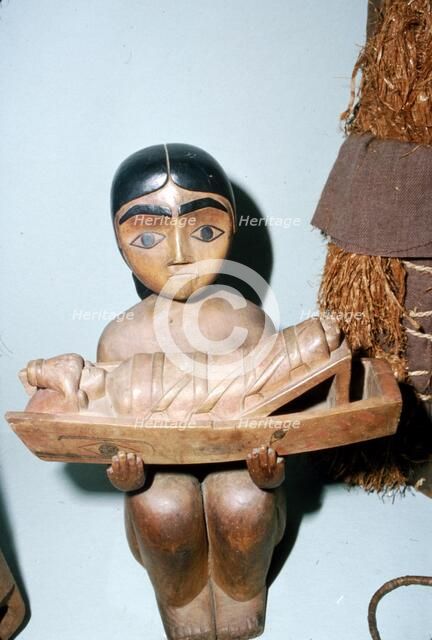 Woman holding Cradle, Salish Tribe, Pacific Northwest Coast Indian. Artist: Unknown.