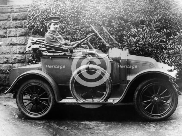Woman in a 1911 convertible Renault AX, c1911. Artist: Unknown