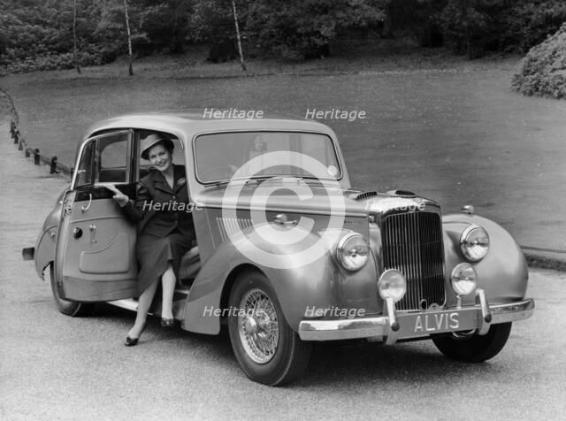 Woman in a 1954 Alvis 3 litre TC 21, (late 1950s?). Artist: Unknown