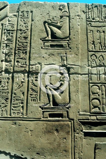 Woman in a birthing chair, Ancient Egyptian limestone relief from Kawm Umbu. Artist: Unknown