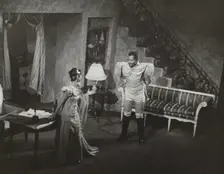Woman in evening dress and Rex Ingram, 1938. Creator: Unknown