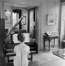Woman in evening dress playing the harpsichord, Fenton House, London, 1960-1965. Artist: John Gay