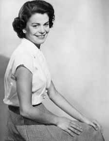 Woman in white blouse, c1955. Creator: Arthur Charles Kirby Ware