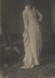 [Woman in White Laced-bodice Dress in Studio of Thomas Eakins], 1880s., 1880s. Creator: Thomas Eakins