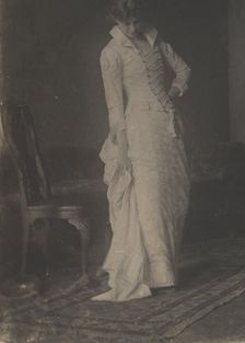 [Woman in White Laced-bodice Dress in Studio of Thomas Eakins], 1880s., 1880s. Creator: Thomas Eakins