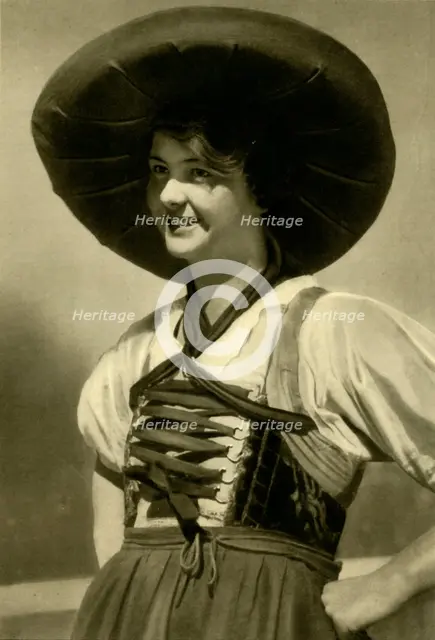 Woman in traditional costume, Tyrol, Austria, c1935.  Creator: Unknown.