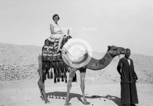 Woman on a camel tour, Egypt, c1920s-c1930s(?). Artist: Unknown