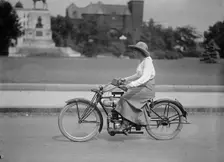 Woman On Bicycle, 1917 or 1918. Creator: Unknown