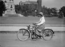 Woman On Bicycle, 1917 or 1918. Creator: Unknown