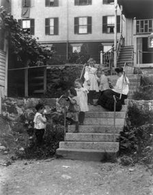 Woman on steps with 5 children, Lynn, Mass., (1895?). Creator: Frances Benjamin Johnston