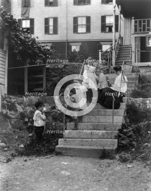 Woman on steps with 5 children, Lynn, Mass., (1895?). Creator: Frances Benjamin Johnston.