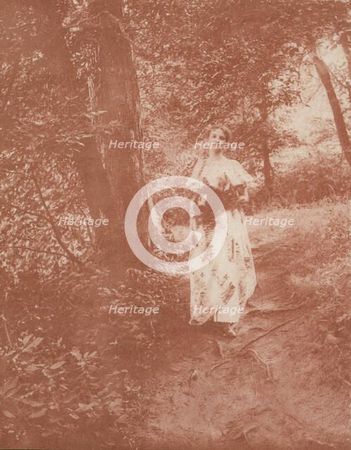 Woman on path in the woods, c1900. Creator: Mary A. Bartlett.