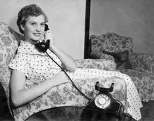 Woman on the telephone, c1955. Creator: Arthur Charles Kirby Ware