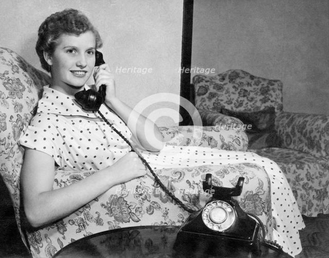 Woman on the telephone, c1955. Creator: Arthur Charles Kirby Ware.