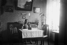 Woman listening to her crystal radio set, Sweden, 1927. Creator: Unknown