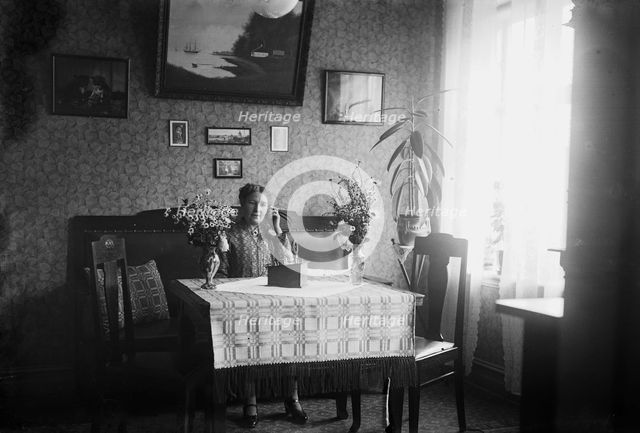 Woman listening to her crystal radio set, Sweden, 1927. Creator: Unknown.