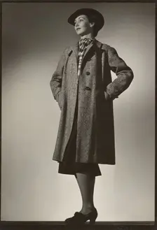 Woman modeling coat, early 1940s. Creator: Gunther Krampf