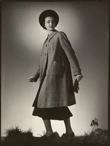 Woman modeling coat, early 1940s. Creator: Gunther Krampf