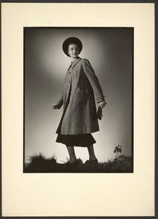 Woman modeling coat, early 1940s. Creator: Gunther Krampf