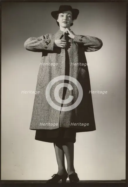 Woman modeling a coat, early 1940s. Creator: Gunther Krampf.
