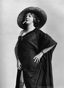 Woman Smoking 1917. Artist: Foulsham and Banfield