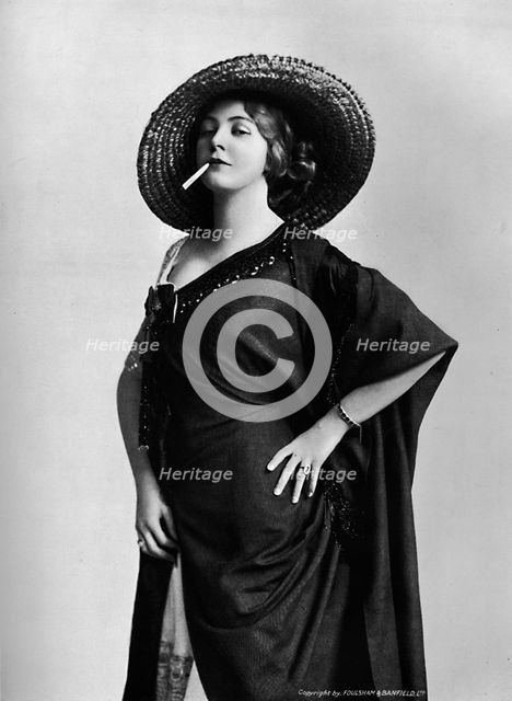 'Woman Smoking', 1917. Artist: Foulsham and Banfield.
