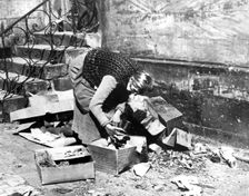 Woman scavenging for food, Bayreuth, Germany, April 1945