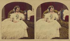 Woman seated in enlongated chair admiring herself in a hand mirror, about 1865. Creator: London Stereoscopic & Photographic Co