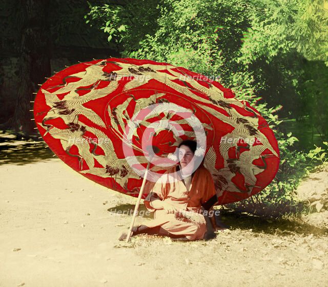 Woman sitting under a parasol, between 1905 and 1915.  Creator: Sergey Mikhaylovich Prokudin-Gorsky.