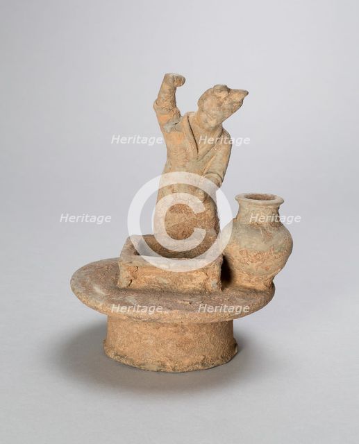 Woman Standing Over a Well, Northern Wei Dynasty (386-535), early 6th cent; with later restorations. Creator: Unknown.