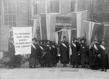 Woman Suffrage - Group Leaving Headquarters, 1917. Creator: Harris & Ewing