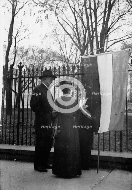Woman Suffrage - David Starr Jordan And Wife Talking with White House Picket, 1917. Creator: Harris & Ewing.