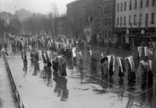 Woman Suffrage - Marching in Rain, 1917. Creator: Harris & Ewing