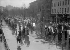 Woman Suffrage - Marching in Rain, 1917. Creator: Harris & Ewing
