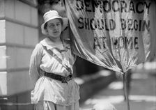 Woman Suffrage - Mrs. Swing, Picketing White House, 1917. Creator: Harris & Ewing