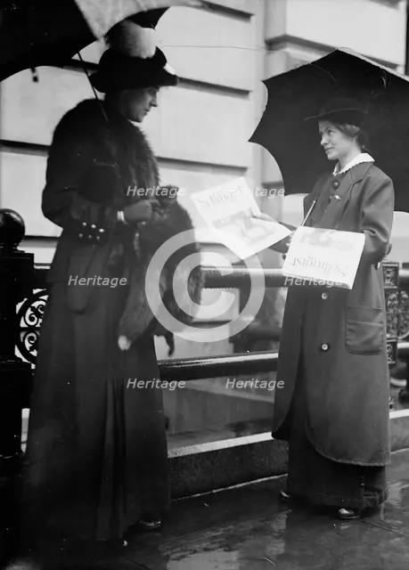 Woman Suffrage - Selling 'The Suffragist', 1914. Creator: Harris & Ewing.