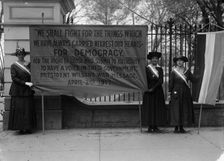 Woman Suffrage - Pickets at White House, 1917. Creator: Harris & Ewing
