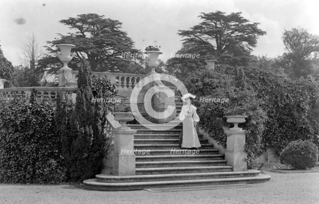 Woman posing at Park Place, Remenham, Berkshire, c1900. Artist: Farnham Maxwell Lyte