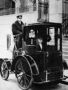 Woman passenger in a 1910 taxi cab, New York, USA, (c1910?)