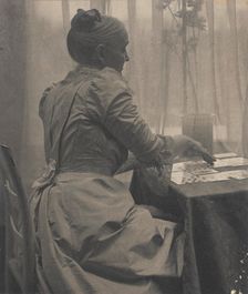 Woman Playing Solitaire, c.1910. Creator: Gertrude Kasebier