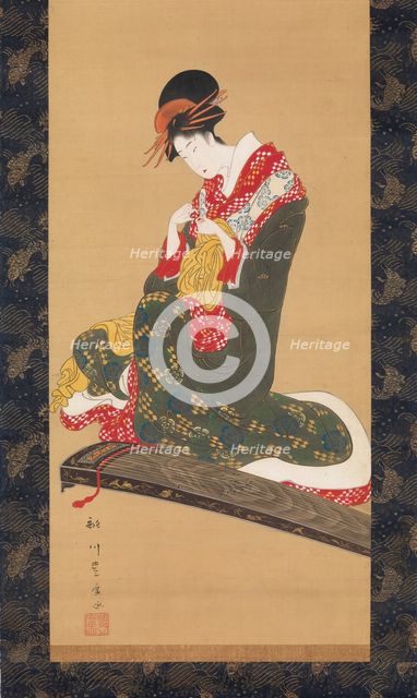 Woman Putting on Finger Plectrums to Play the Koto, early 19th century. Creator: Utagawa Toyohiro.