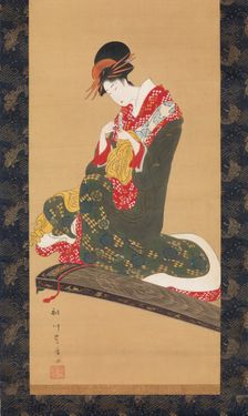 Woman Putting on Finger Plectrums to Play the Koto, early 19th century. Creator: Utagawa Toyohiro