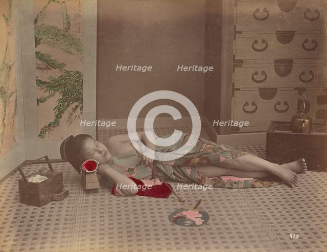 Woman Reclining with Pipe, 1870s-1890s. Creator: Kusakabe Kimbei.